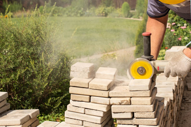 istock Master saws paving slabs with a grinder grinder. Dust 1282619050