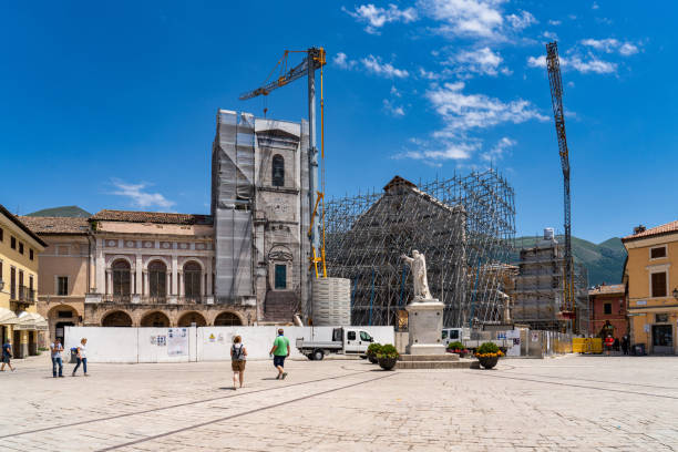 The center of Norcia at July 2020 after the earthquake of central Italy 2016 Norcia, Italy - Jul 02, 2020: The historic center of Norcia city at July 2020 after the earthquake of central Italy in 2016 macerata italy stock pictures, royalty-free photos & images