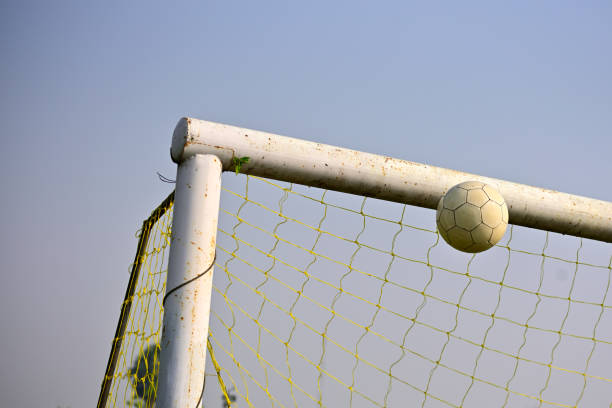 istock Scoring Soccer goal 1282621115