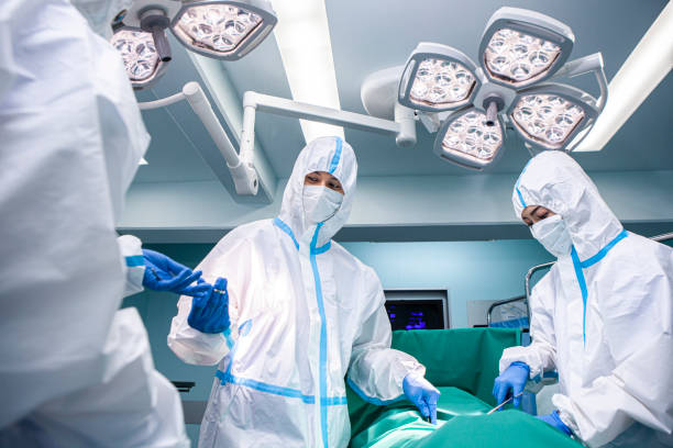 istock Doctors operating patients infected with covid-19 1282621149