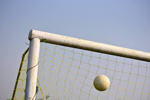 istock Scoring Soccer goal 1282621388