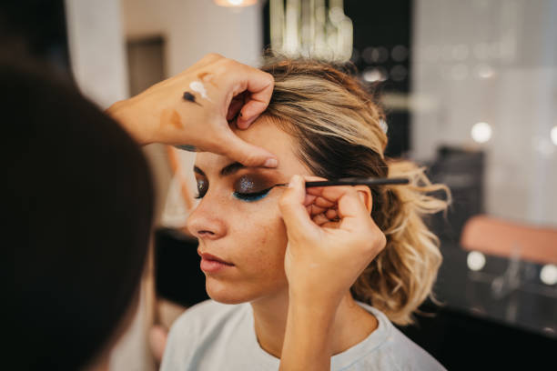istock Professional makeup artist at work 1282625327