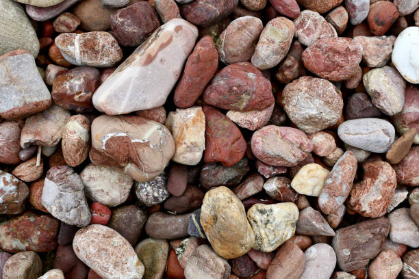 istock Red pebbles stone for background,abstract. 1282626057