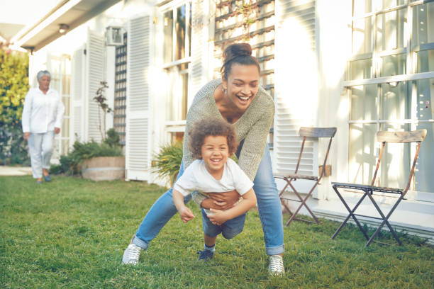 istock Young mother is playing with her son 1282631304