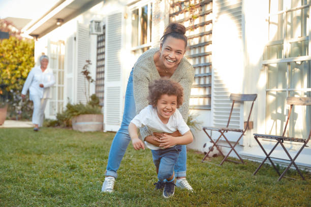 istock Young mother is playing with her son 1282631368