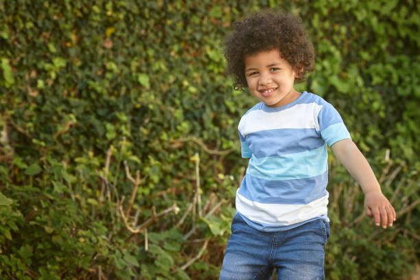 istock Cute boy having fun in his garden 1282631414