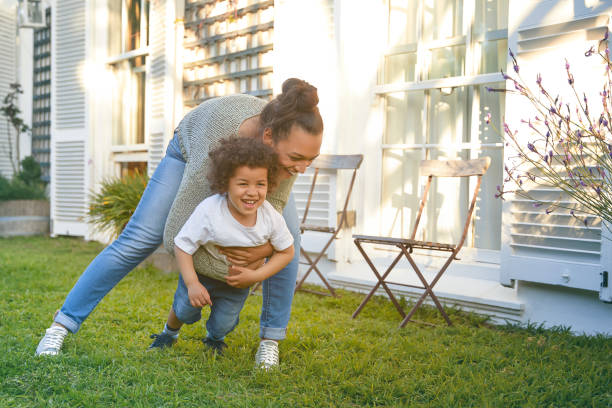 istock Young mother is playing with her son 1282631415