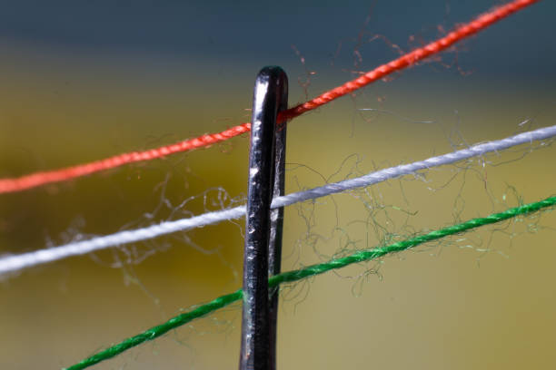 istock Indian flag colour threads going through the needle 1282633831