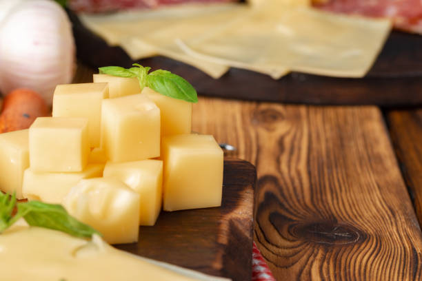 istock Cut pieces of hard cheese close up 1282643913