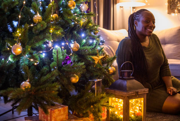 istock Beautiful Black woman at Christmas 1282643944