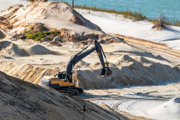 istock Sand extraction with machinery at quartz quarry 1282645331