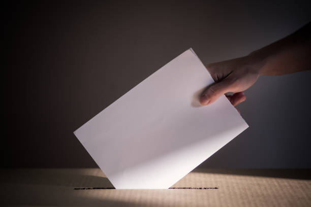 istock Conceptual image of a person voting during elections 1282646055