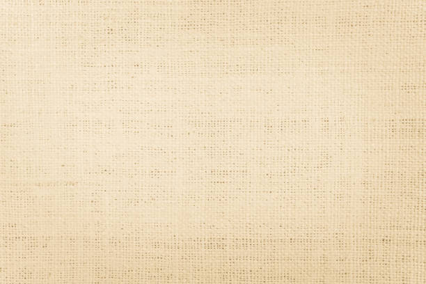 istock Brown Hemp rope texture background. Sackcloth or blanket wale linen wallpaper. Rustic sack canvas fabric texture in natural. Haircloth vintage linen burlap weaving, Old beige carpet background. 1282646413