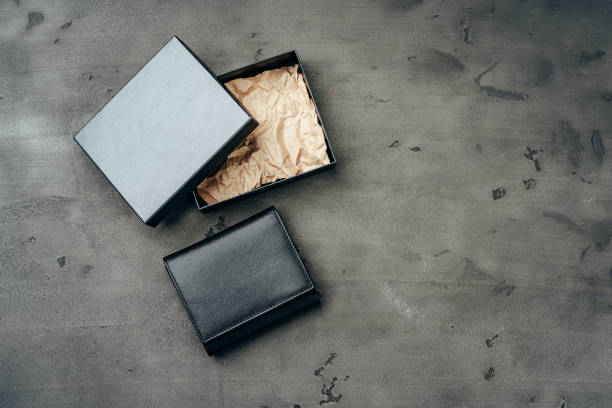 istock Black leather wallet on grey concrete background 1282648643