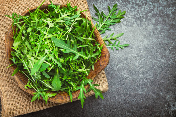 Fresh arugula Fresh arugula with copy space. Top view arugula stock pictures, royalty-free photos & images