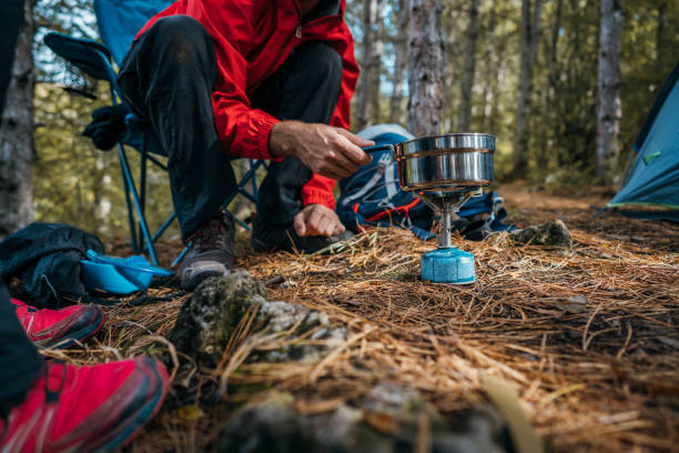 istock Preparing a tea in the camp 1282648866