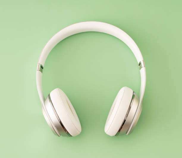 fone de ouvido em fundo verde - headset hands free device single object nobody - fotografias e filmes do acervo