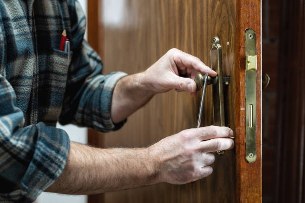 istock Carpenter at work repairs the door lock. Carpentry. 1282651777