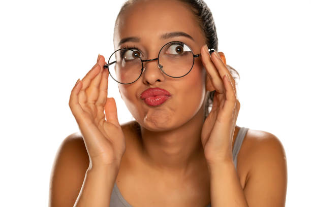 istock Funny young dark skinned woman with eyeglasses 1282653339