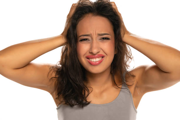 istock nervous woman with messy hair 1282653980