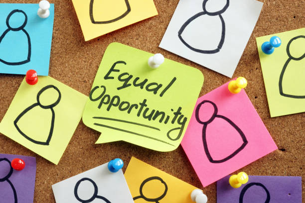 istock Equal opportunity memo and figures on the pages. 1282661214