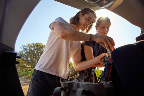 istock Young Couple Preparing For Hiking 1282662854