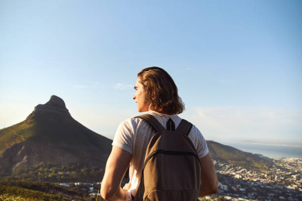 istock Young Man Enjoying A Hike On a Sunny Day 1282662873