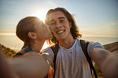 Young Couple Taking Selfie While Hiking