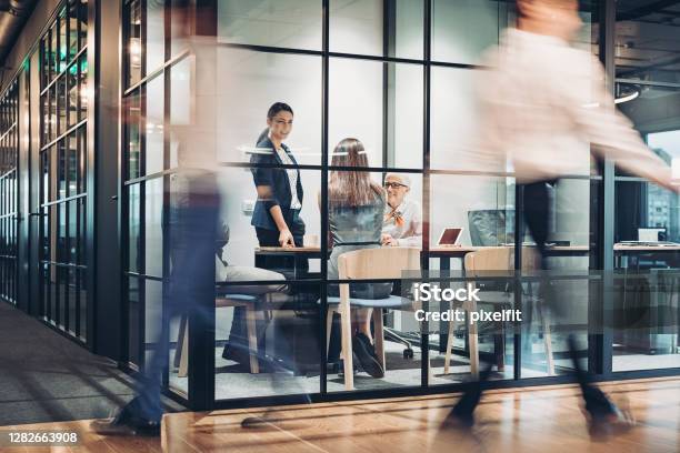 Business Persons Walking And Working Around The Office Building Stock Photo - Download Image Now