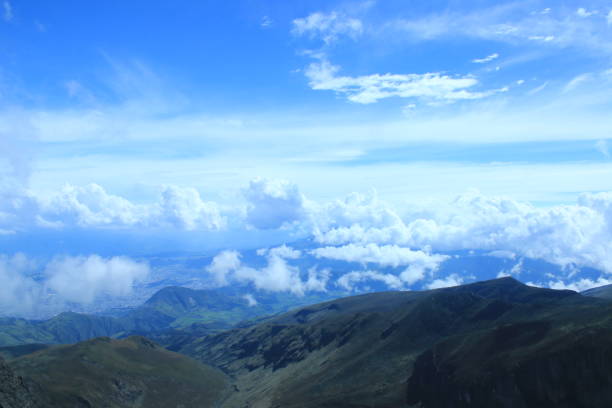 istock An andean mountain ridge with a stunning cloudscape and bright blue sky 1282664037
