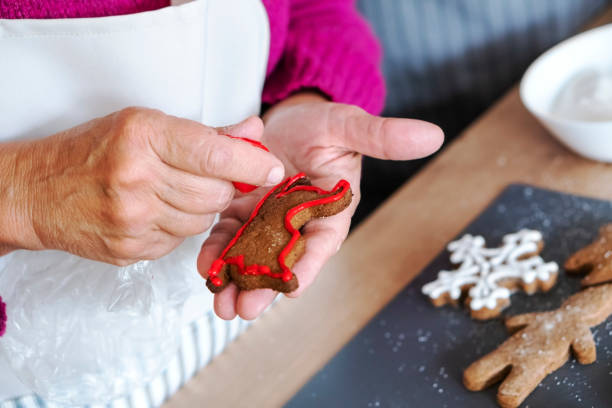 istock Senior woman making Christmas cookies 1282666023
