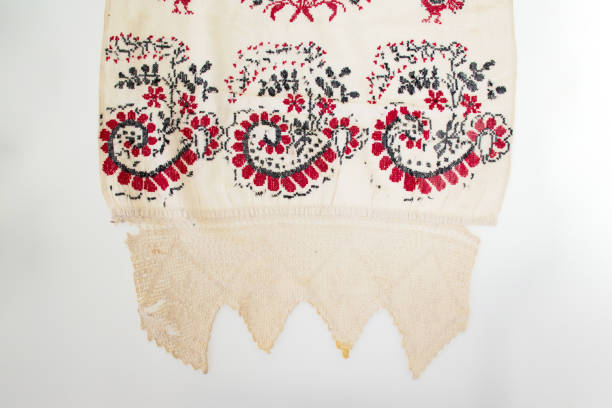 istock Vintage embroidered fabric on white background 1282667743