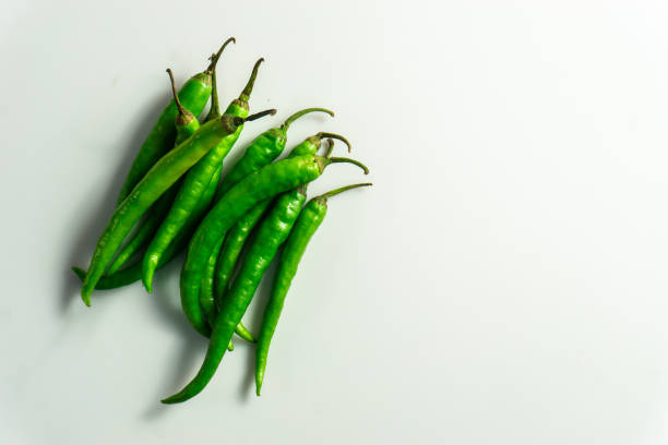 istock Group of green chilly stacked together 1282669989