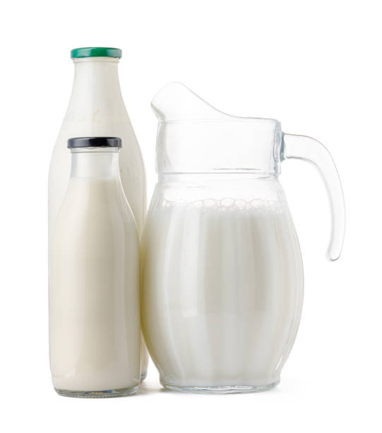 istock Glassware full of fresh milk isolated on white 1282672447