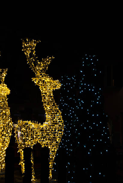 istock Reindeer shaped Christmas yellow lights 1282673858