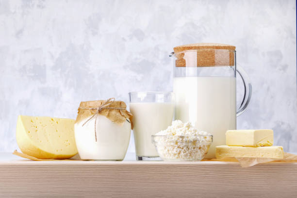istock Set of different dairy products on wooden table. 1282674444