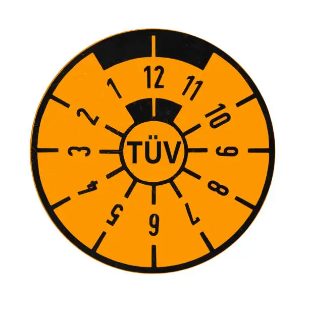 TÜV sticker on white background with clipping path
