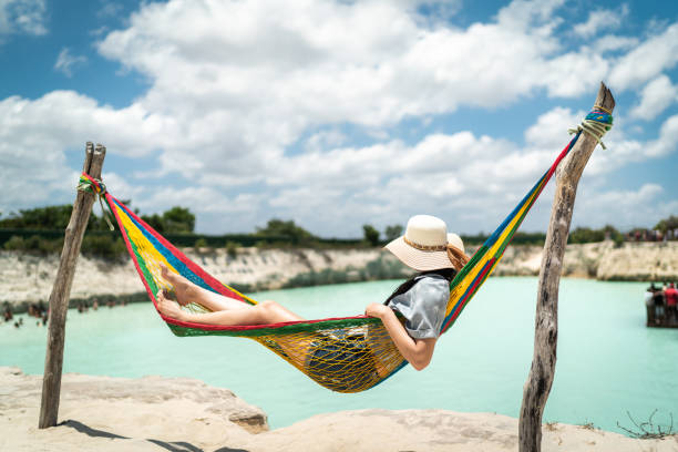 Woman in a hammock in the beach in Jericoacoara