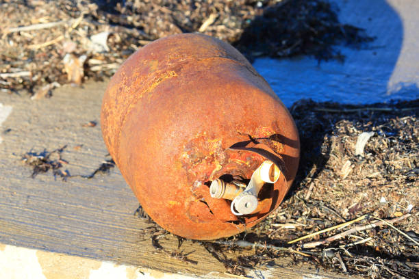 istock Garbage on the beach, Propane tank 1282680552