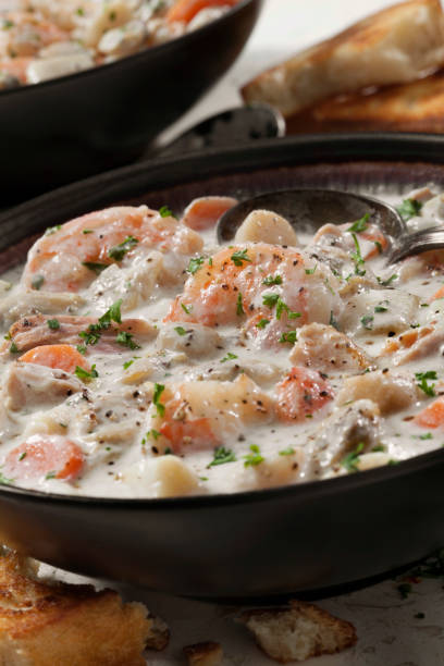 istock Seafood Chowder with Shrimp, Bay Scallops, Clams and Salmon 1282683724