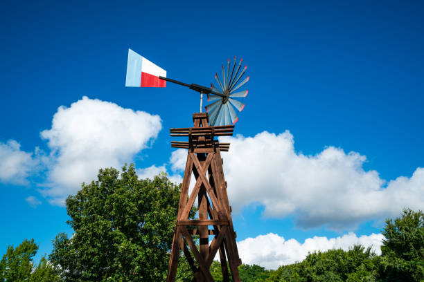 istock Texas Windmill on Wooden Trestle during Perfect Summer Day 1282683858