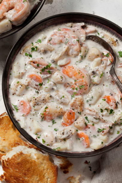istock Seafood Chowder with Shrimp, Bay Scallops, Clams and Salmon 1282683886