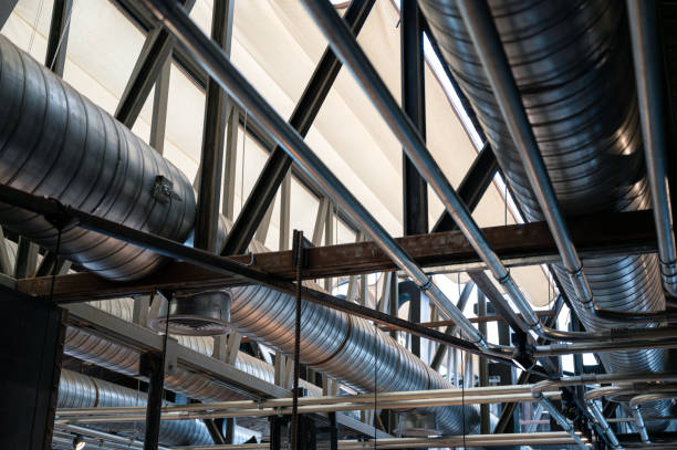 istock Ceiling structure with steel ventilation pipe and pipe systems 1282692183