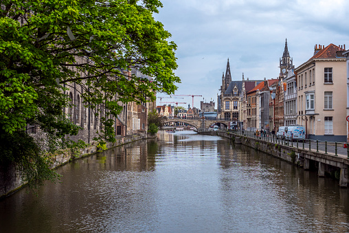 Medieval houses and bridge seen from a canal in Ghent - Gent, Belgium