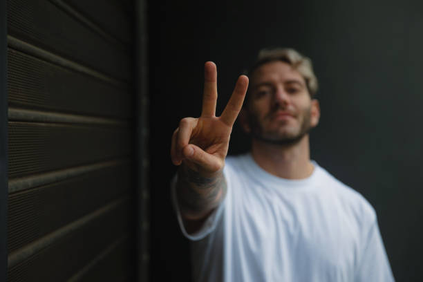 istock Men showing victory sign 1282695817