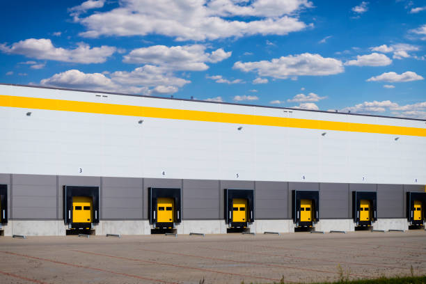 istock Unloading ramps in warehouse building 1282698442