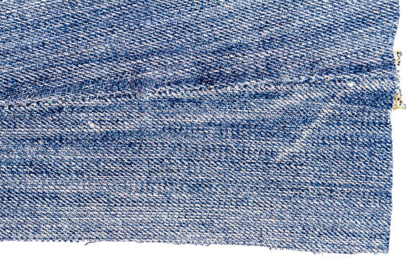 istock Piece of light blue jeans fabric 1282701226