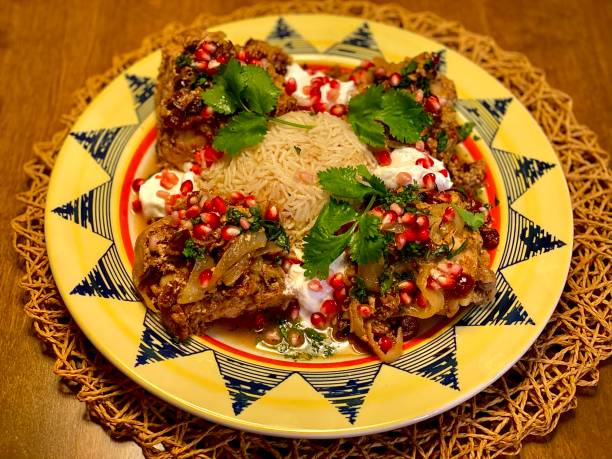 istock Napa Valley Braised Chicken Thighs with Pomegranate Onion Fruit Compote 1282703104