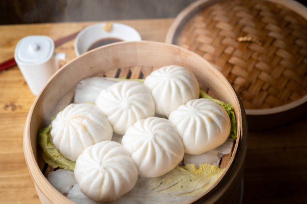 istock chinese buns in bamboo steamer 1282706389