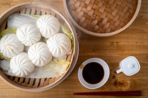 istock chinese buns in bamboo steamer 1282706399